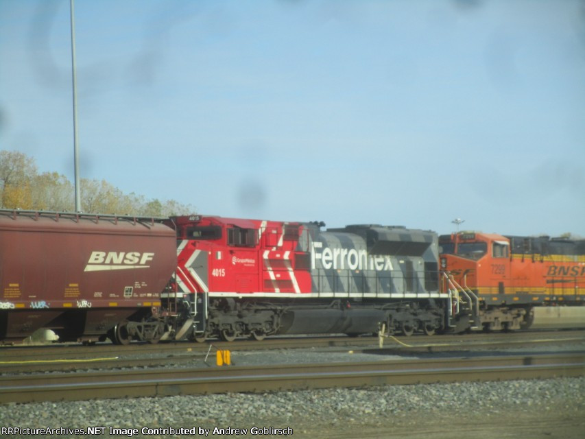 FXE 4015 + BNSF 7299